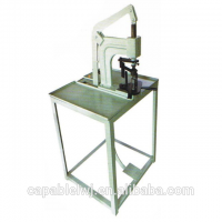 Cap top button cover fixing machine