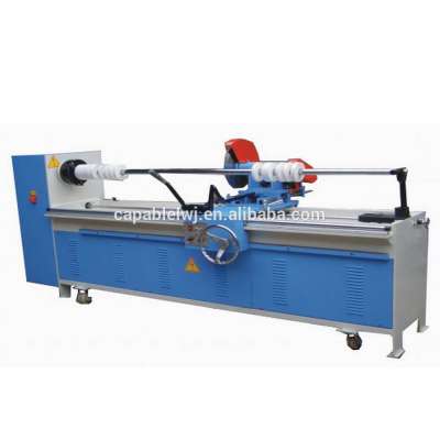 Braided cloth parting and rewinding machine